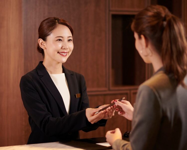 Behind the Smiles: The Hidden Strain of Hotel Work - TRAVELINDEX